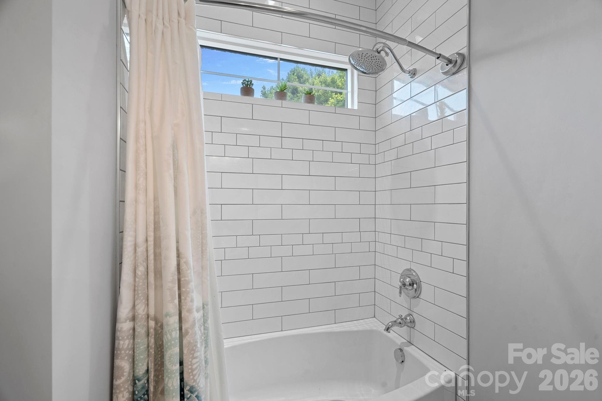Shower area with subway tile. jack and jill bath - walkout basement - 2889 Mount Pleasant Road, Sherrills Ford