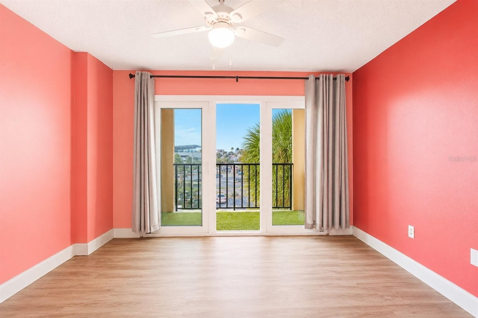 Guest bedroom with private balcony. - 51 ISLAND WAY #311, CLEARWATER BEACH