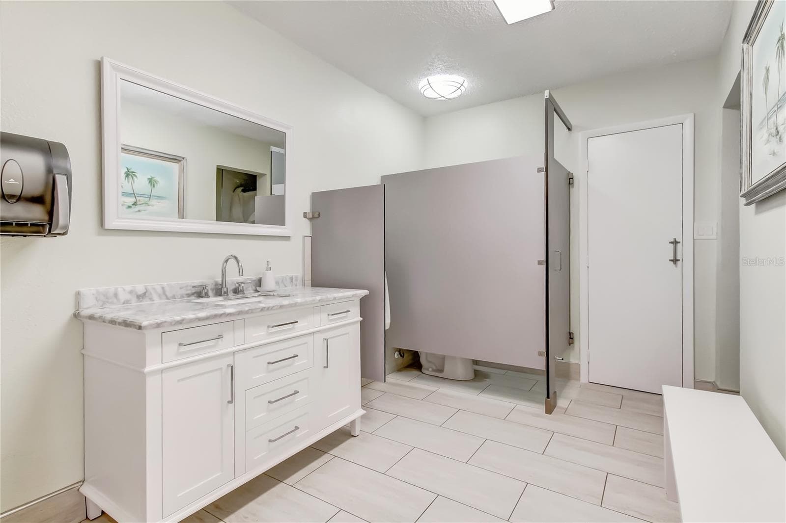 Updated Pool Bathrooms with Shower and Sauna. - 51 ISLAND WAY #311, CLEARWATER BEACH
