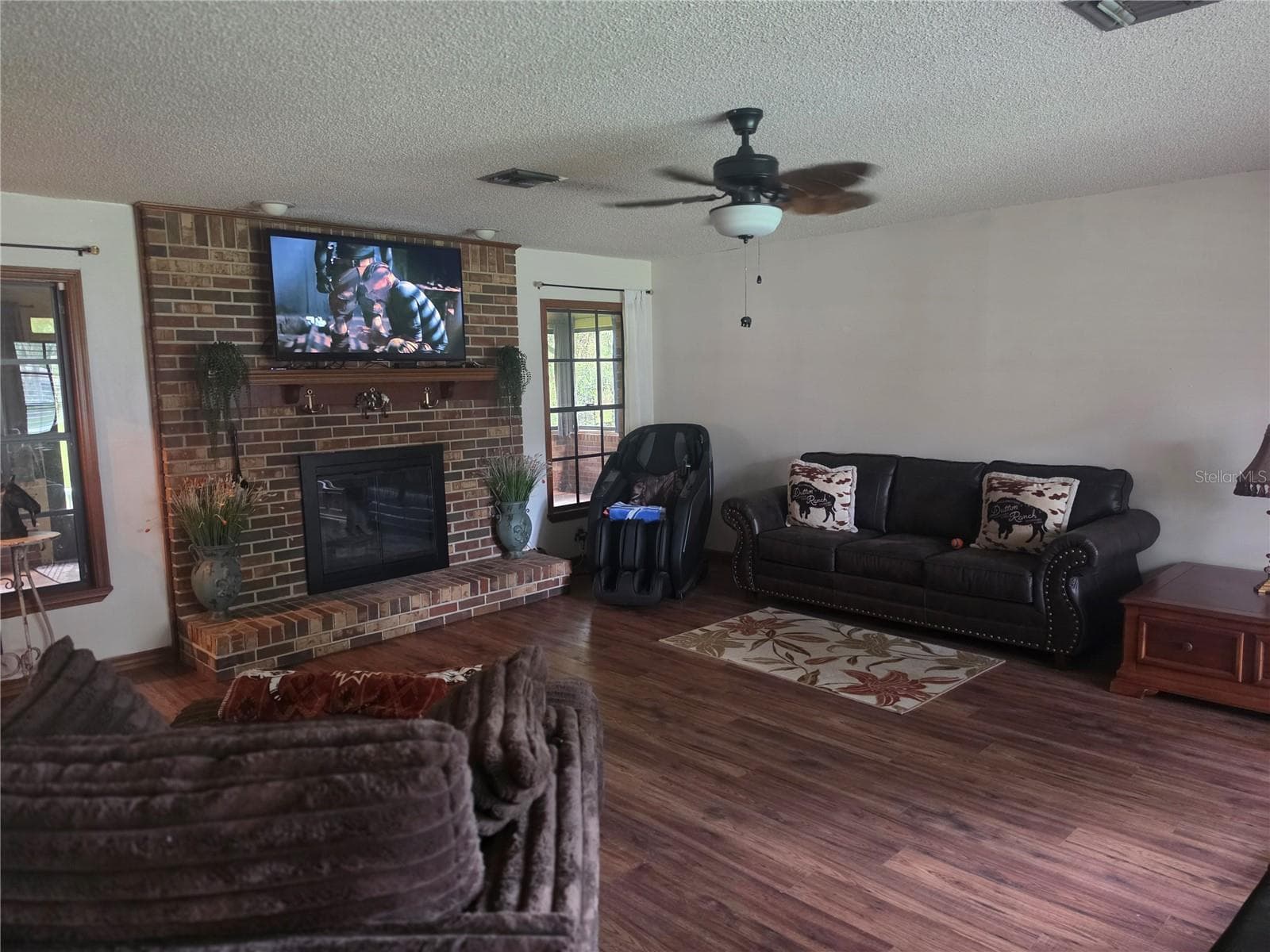 Great room with wood burning fireplace - 2417 S OAK PARK DR, DELAND