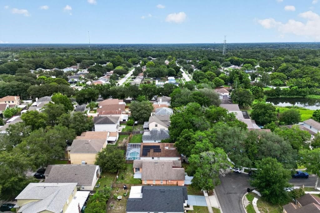 Aerial view highlighting the home's location within the neighborhood. - 97 ABBEY HOLLOW DR, APOPKA