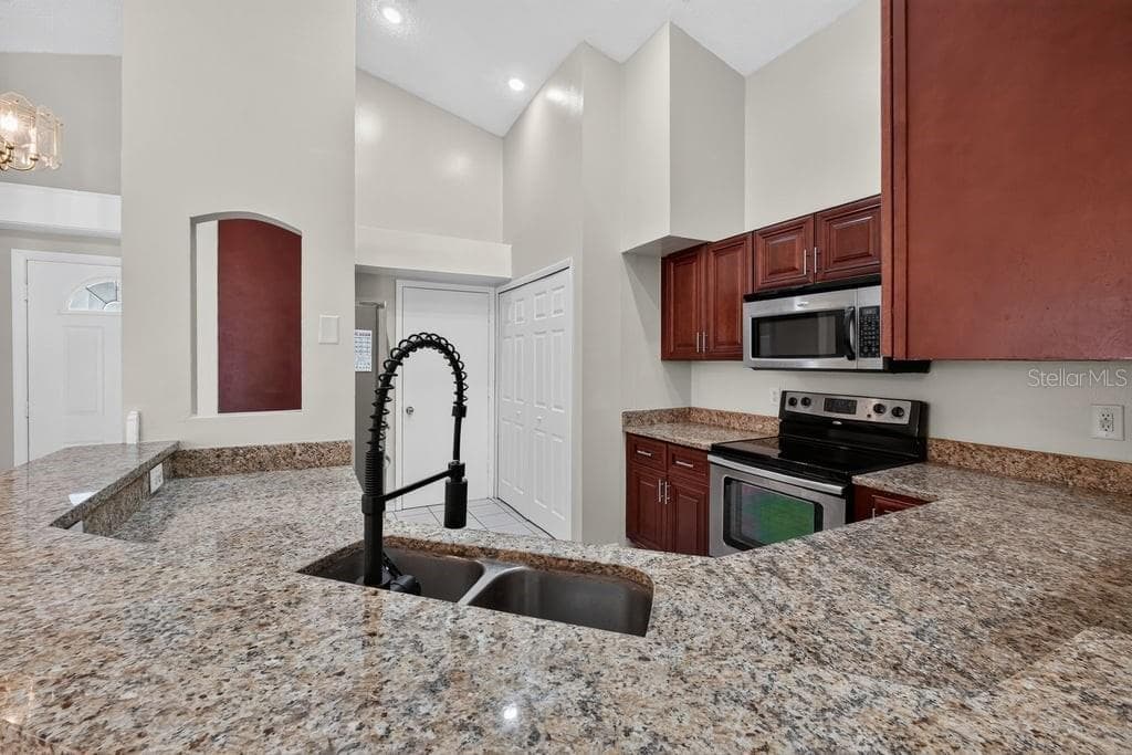 Single Family Residence at 97 ABBEY HOLLOW DR, APOPKA, photo 8 of 35