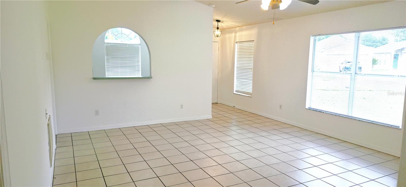 Livingroom facing kitchen - 2160 EOLA CT, OVIEDO