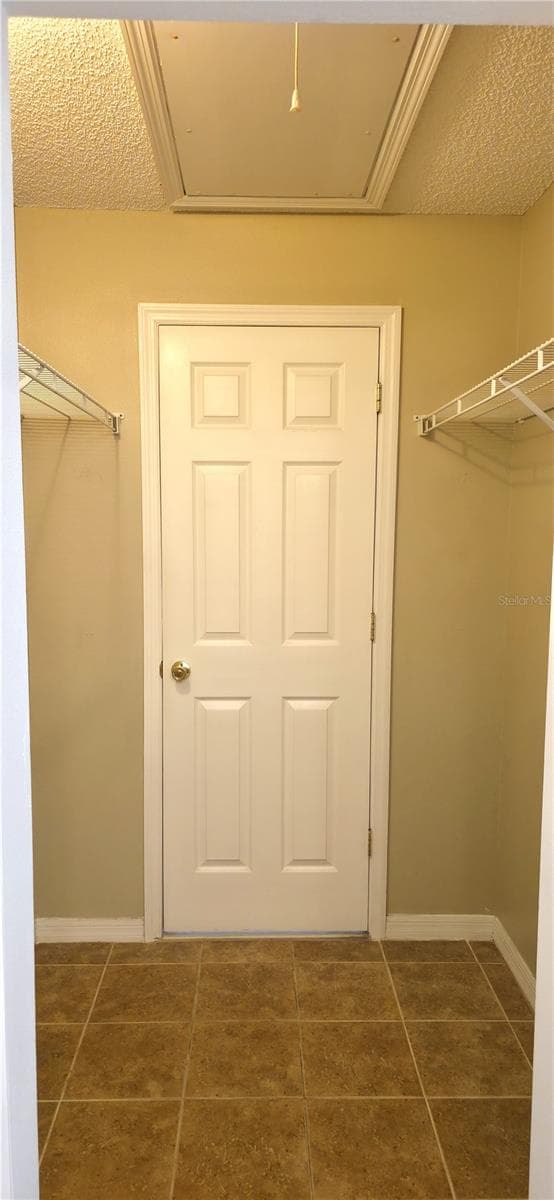 Master bedroom walk in closet POV from bathroom - 2160 EOLA CT, OVIEDO