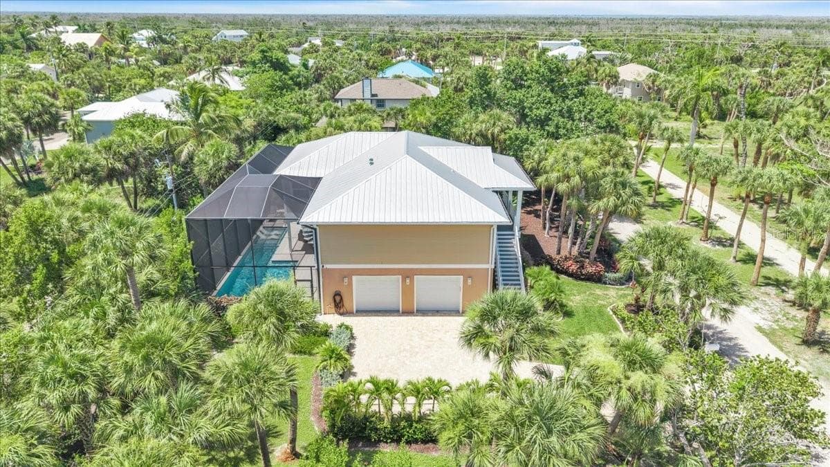 Single Family Residence at 9277 BELDING DR, SANIBEL, photo 2 of 78