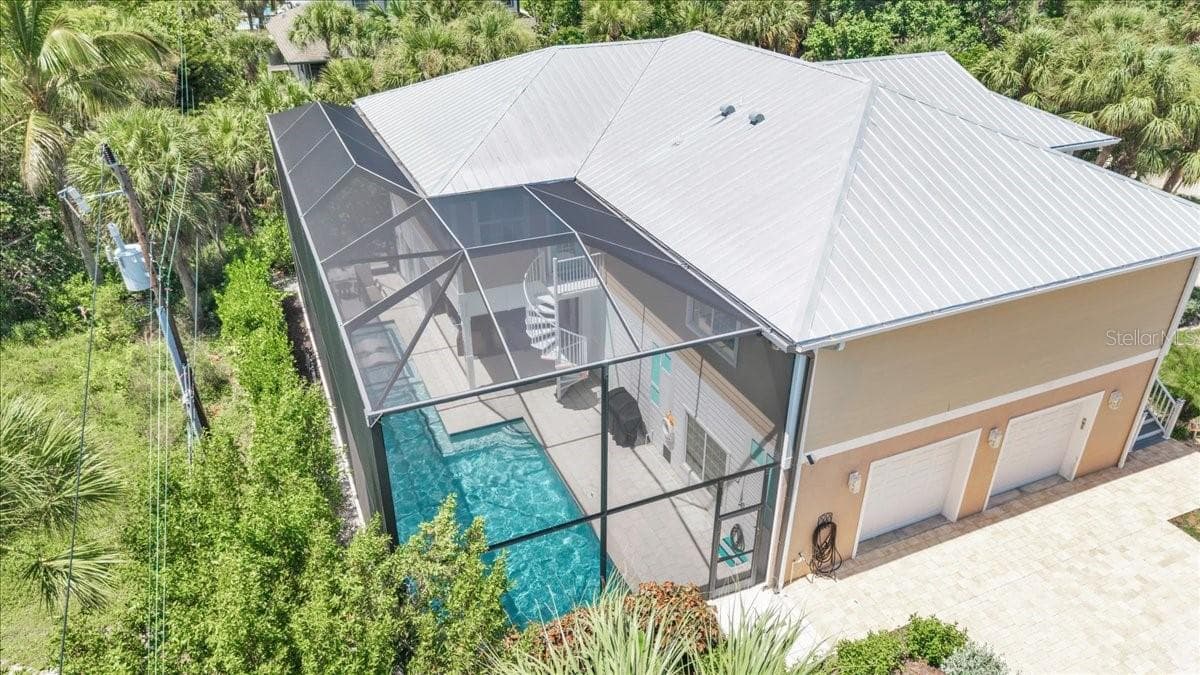 Single Family Residence at 9277 BELDING DR, SANIBEL, photo 65 of 78