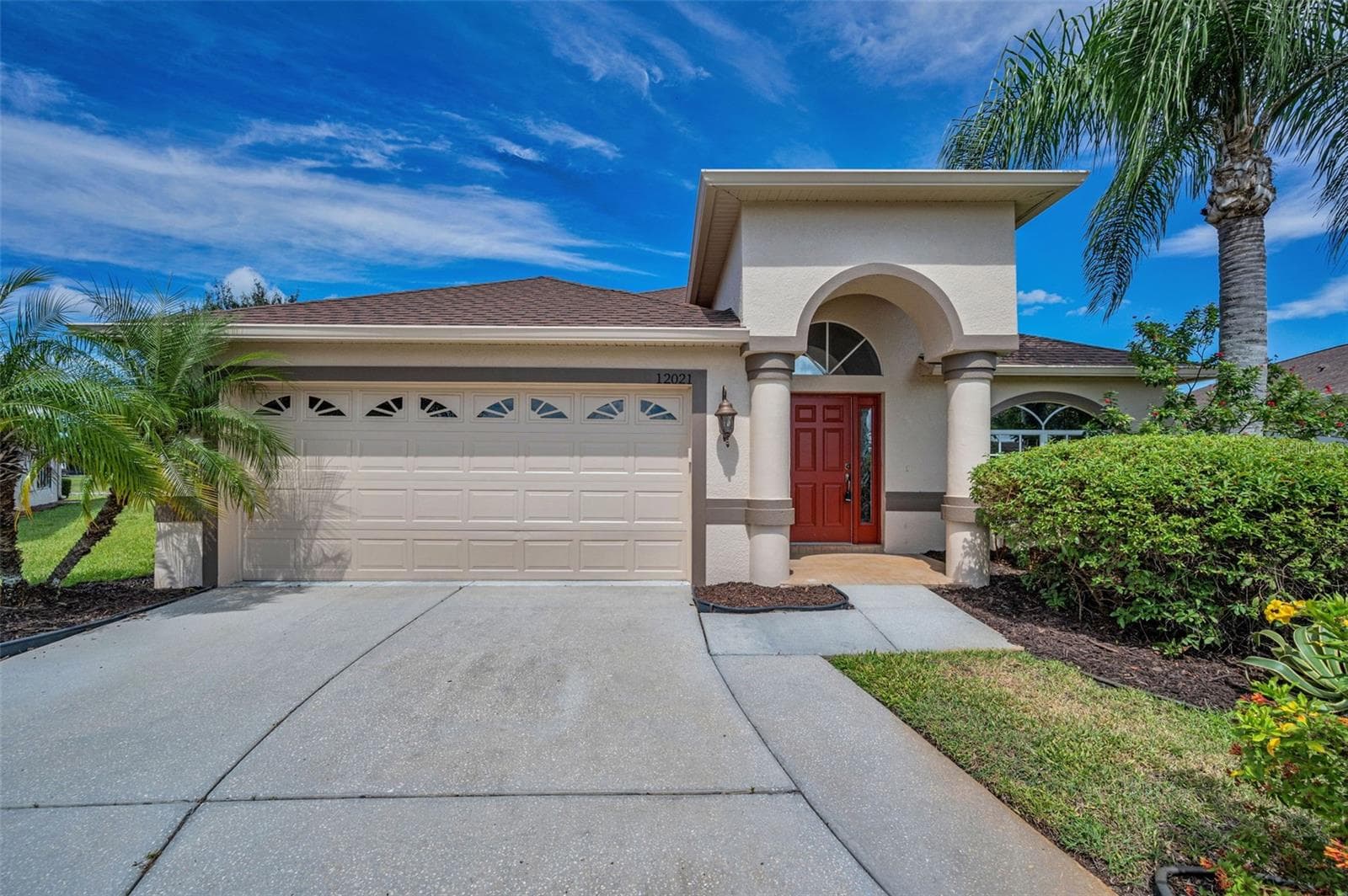 WIDE DRIVEWAY TO 2 CAR GARAGE PROVIDES ADDITIONAL PARKING FOR FRIENDS AND GUESTS. - 12021 FERN TERRACE CT, TRINITY