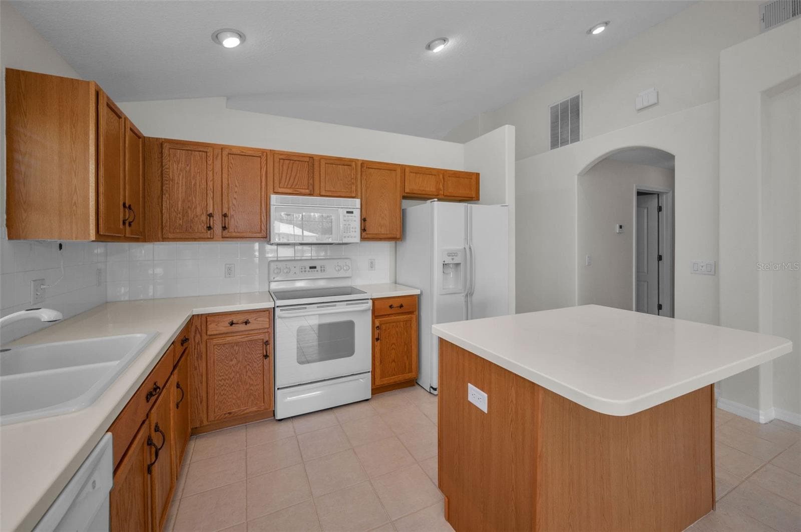 KITCHEN WITH CENTER ISLAND - 12021 FERN TERRACE CT, TRINITY