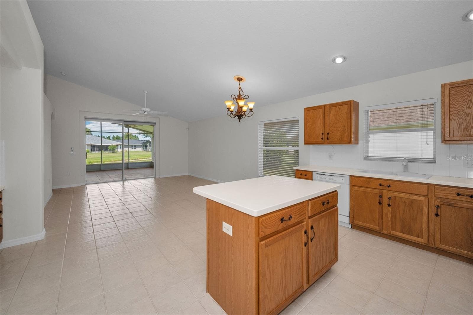 VIEW OF KITCHEN AND FAMILY ROOM - 12021 FERN TERRACE CT, TRINITY