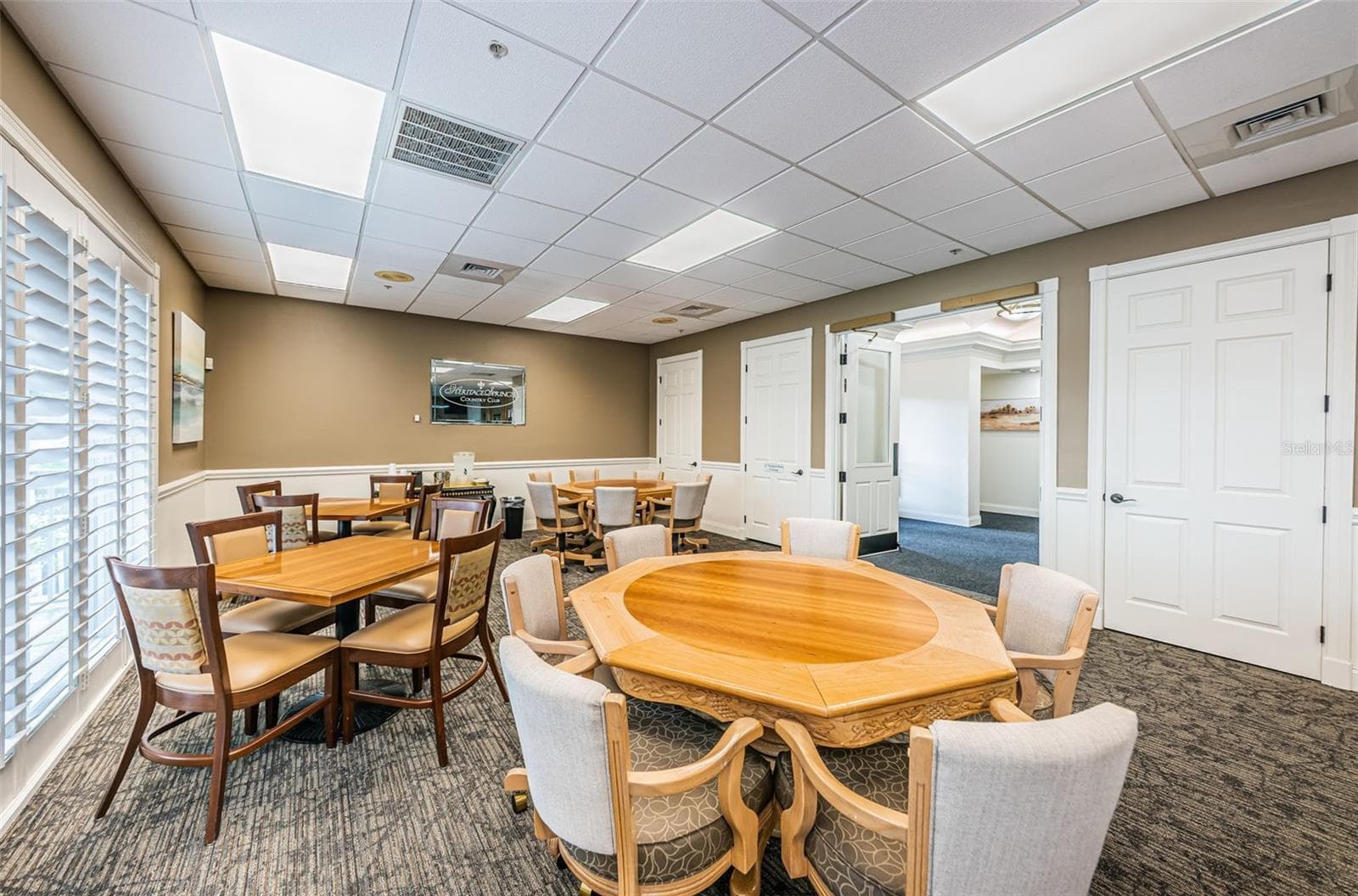 ONE OF THE GAME ROOMS INSIDE CLUBHOUSE - 12021 FERN TERRACE CT, TRINITY