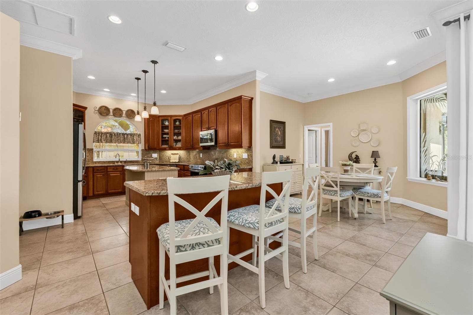 Tons of Can Lights! Soft close cabinetry, pull-out drawers on lower cabinets plus glass fronts on some uppers. - 24228 PEPPERCORN RD, PUNTA GORDA