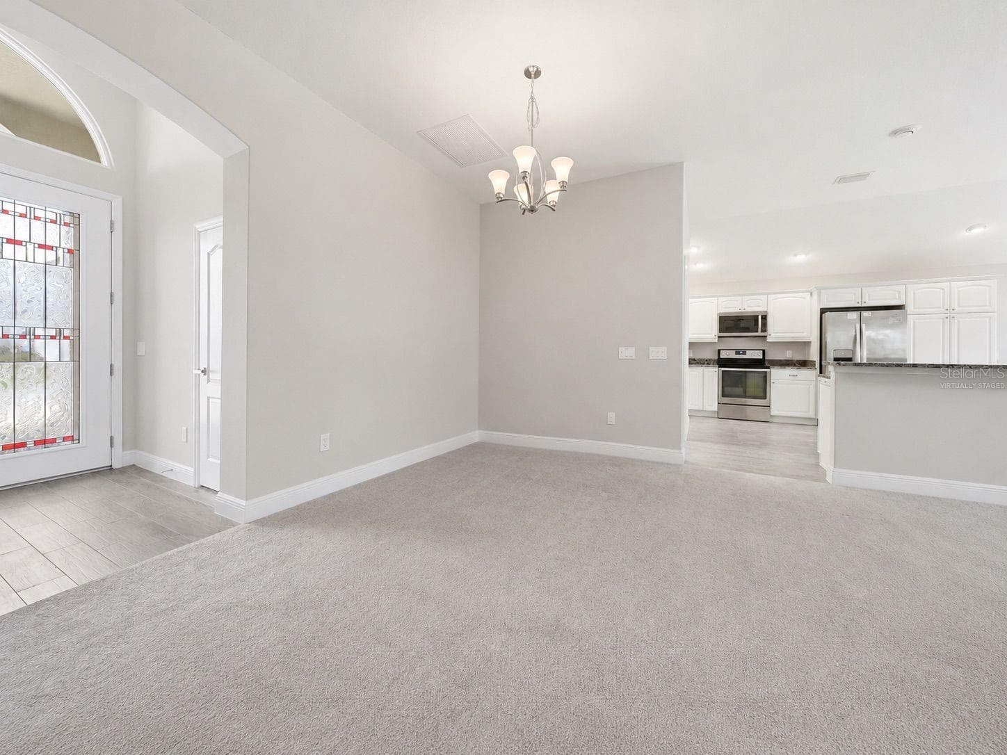 virtually staged  front entry to lr - 1166 BLOUNT AVE, THE VILLAGES