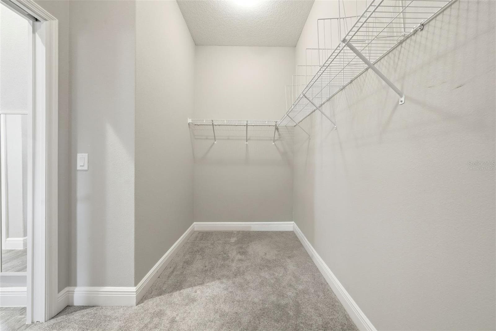 virtually staged closet primary - 1166 BLOUNT AVE, THE VILLAGES