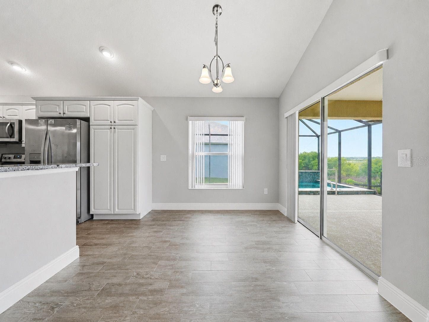virtually staged dining area - 1166 BLOUNT AVE, THE VILLAGES