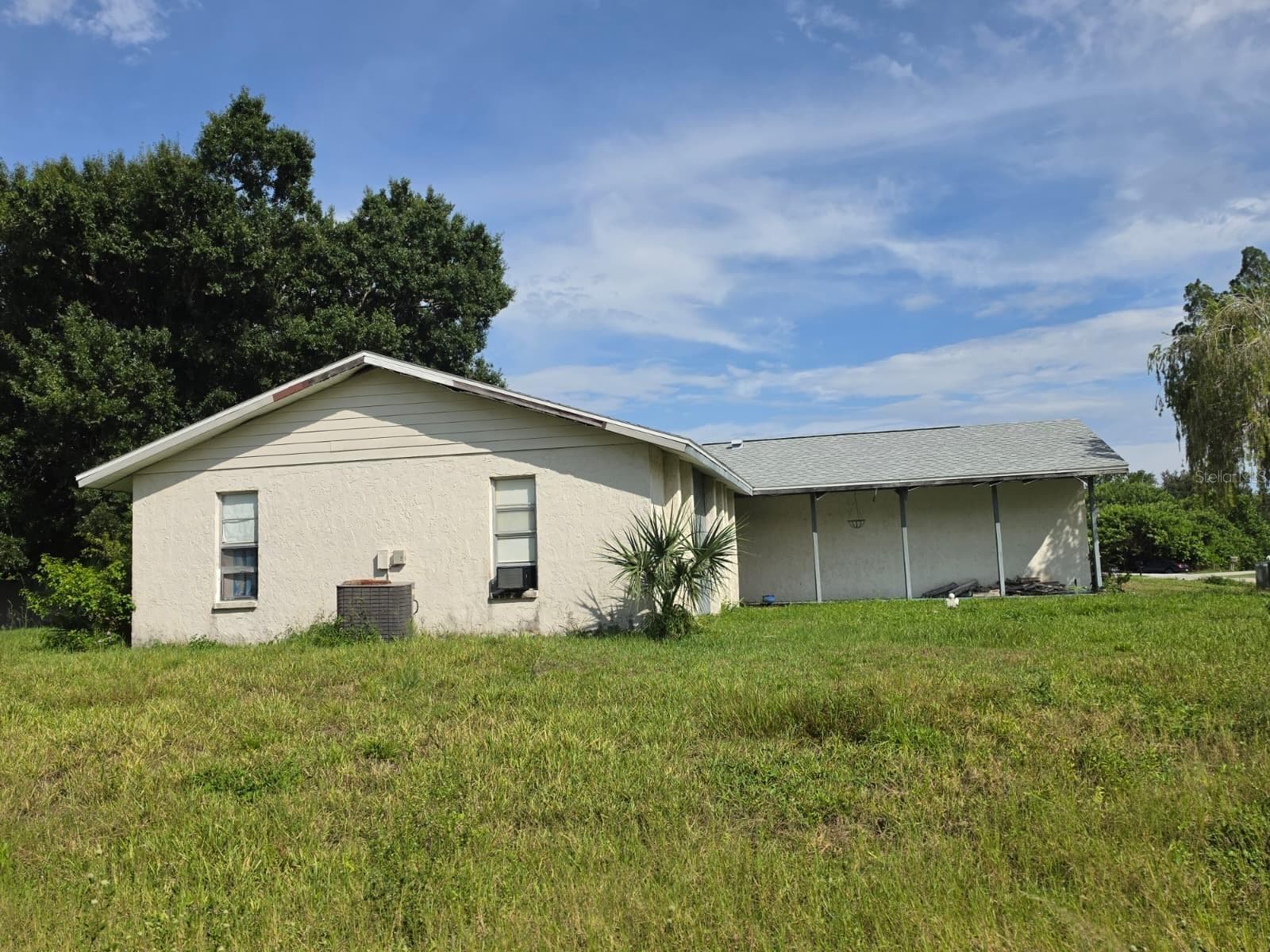 Single Family Residence at 586 ALTOONA ST NW, PORT CHARLOTTE, photo 2 of 4