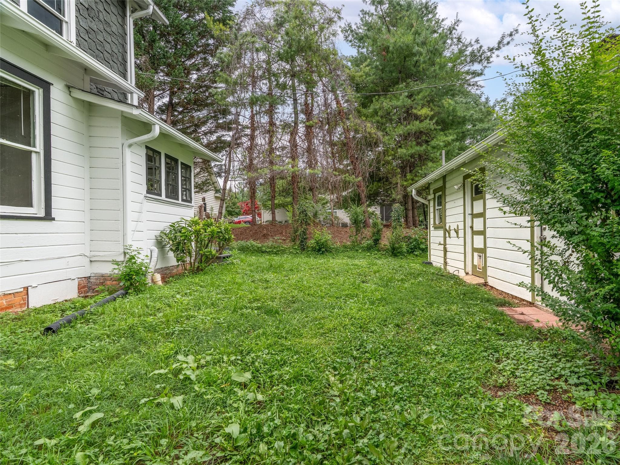 Side Yard Between Main House & Studio - 111-113 Stewart Street, Hendersonville