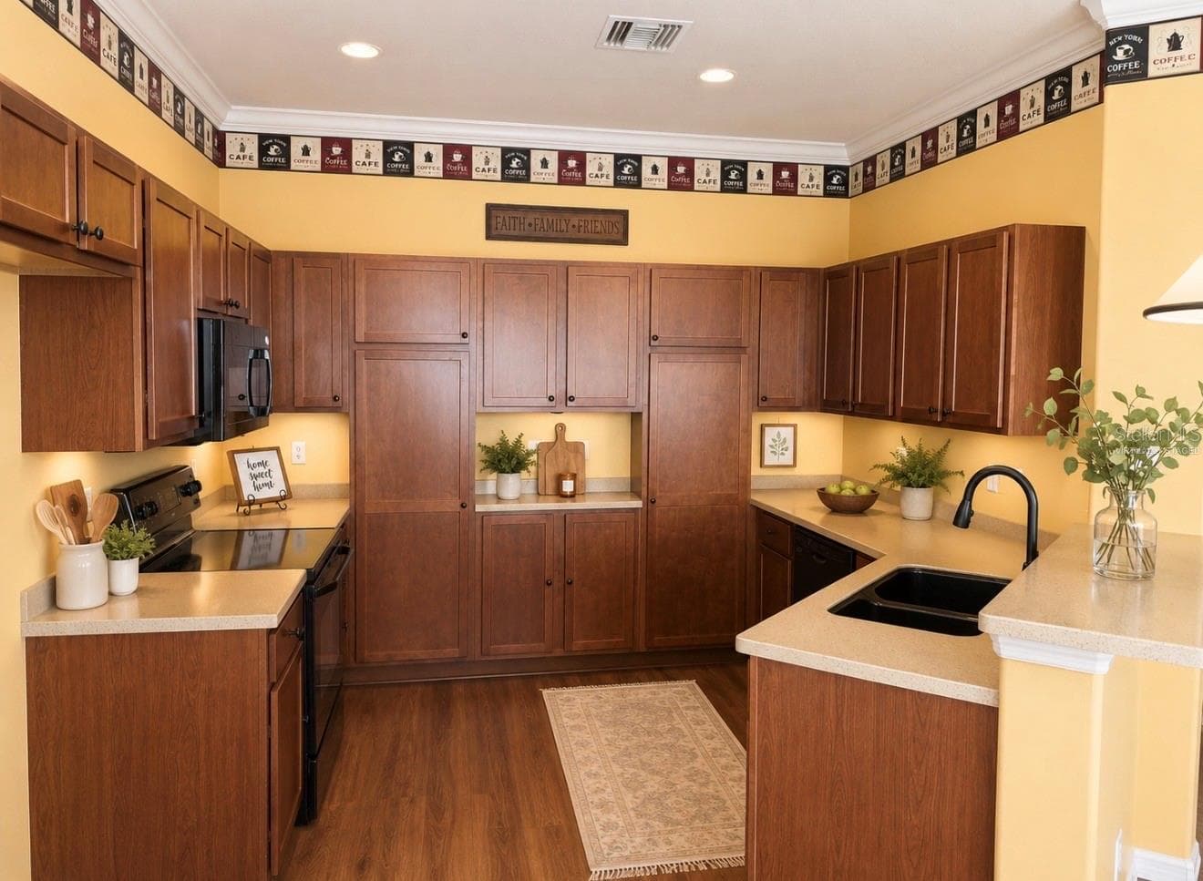 Virtually staged kitchen - 3933 SERENADE LN, LAKELAND
