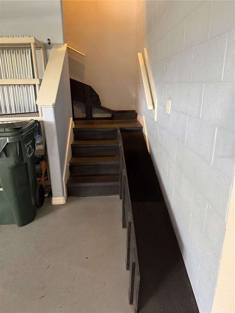 Steps up from garage with doggie ramp - 3933 SERENADE LN, LAKELAND
