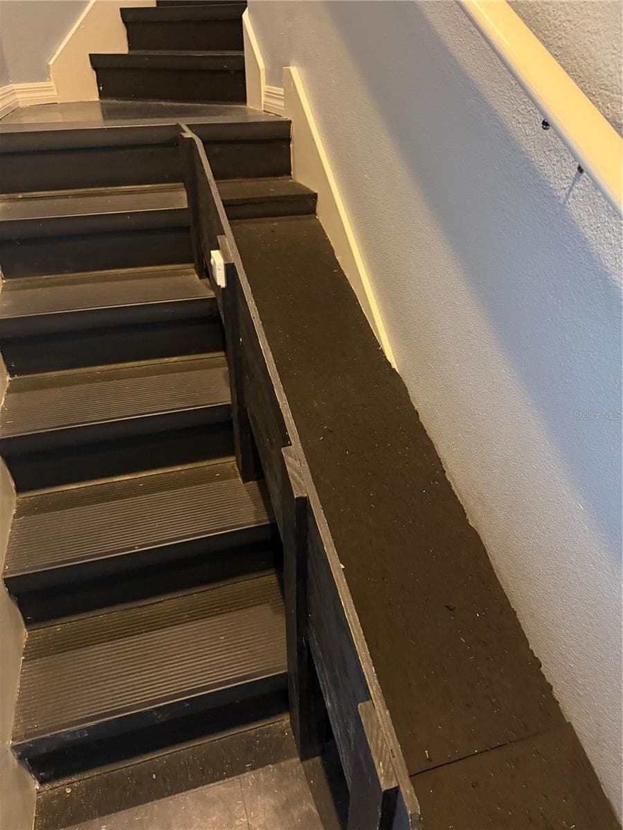 Steps up from garage with doggie ramp - 3933 SERENADE LN, LAKELAND