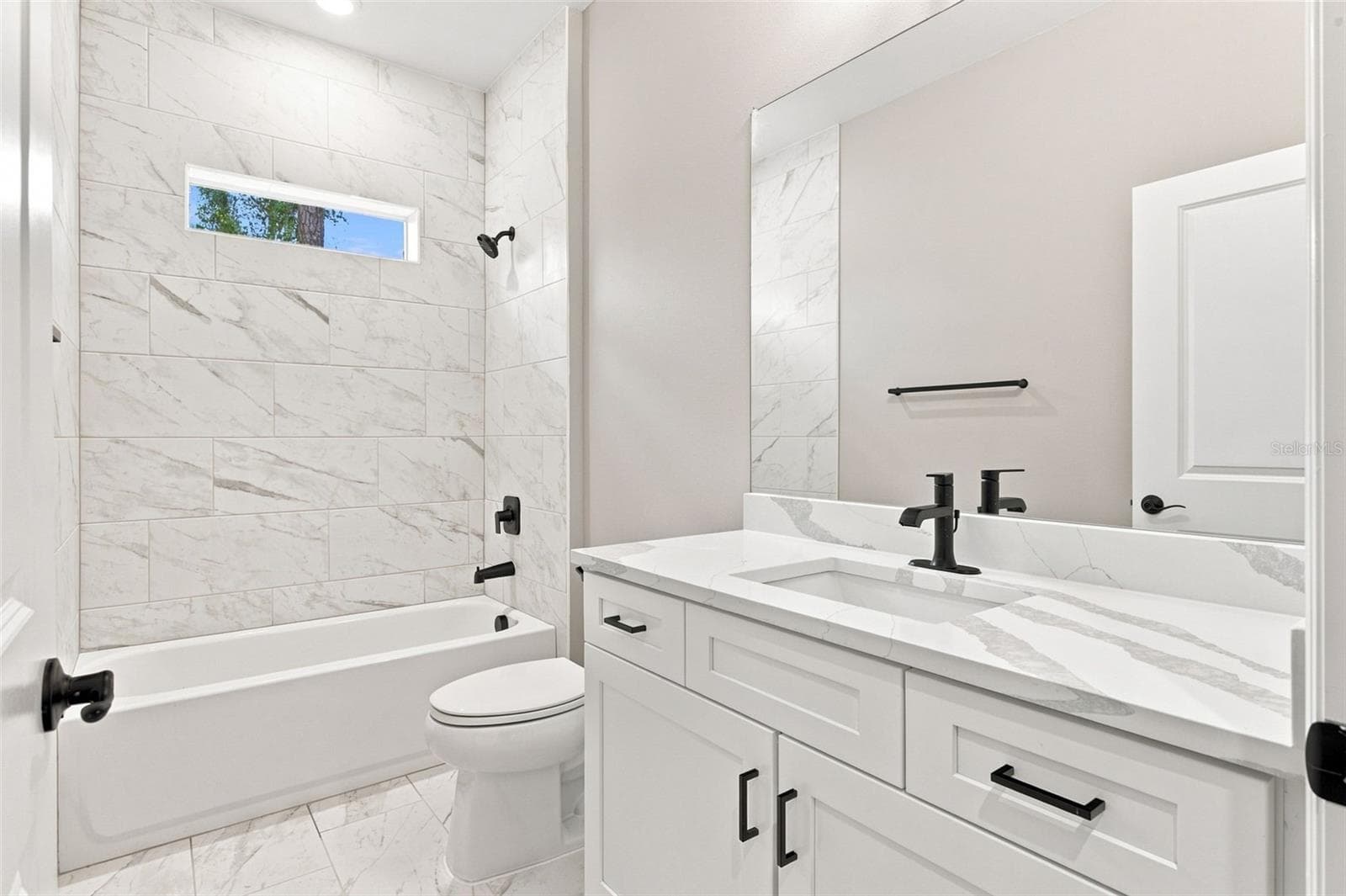 Bathroom 2 - 8211 ELKENBERRY AVE, NORTH PORT