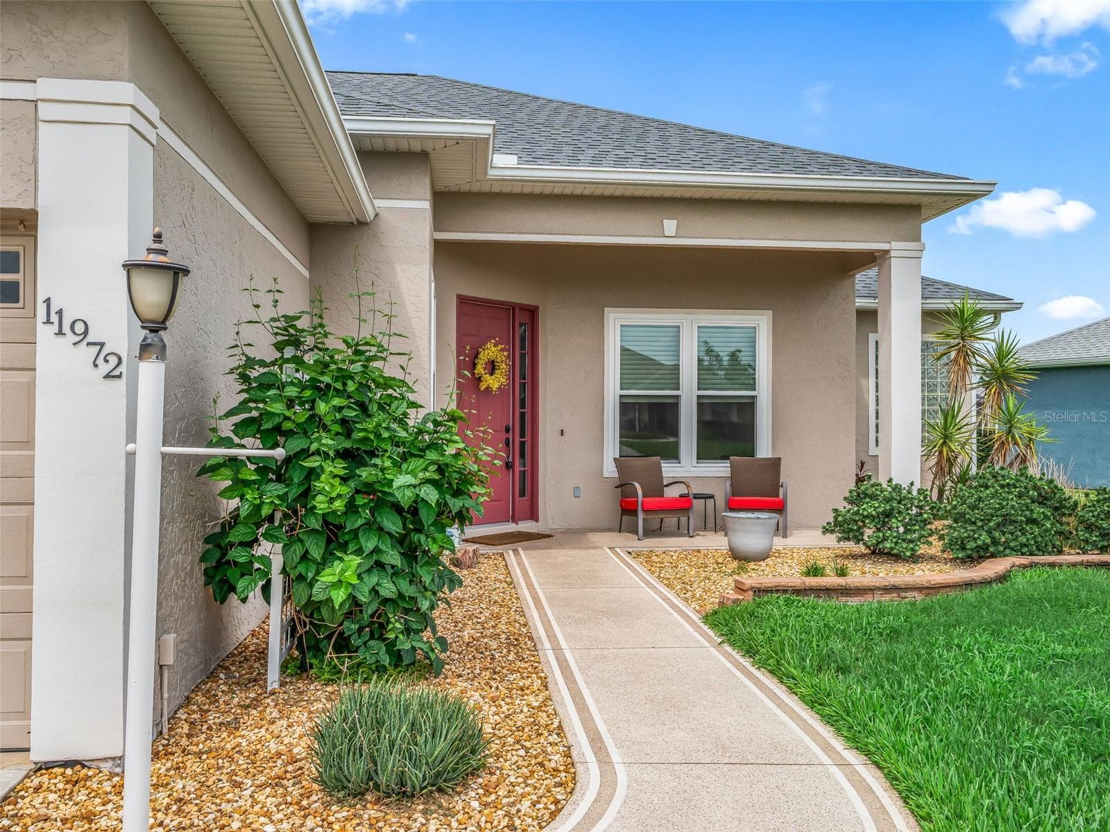 Covered front porch - 11972 SE 176TH PLACE RD, SUMMERFIELD