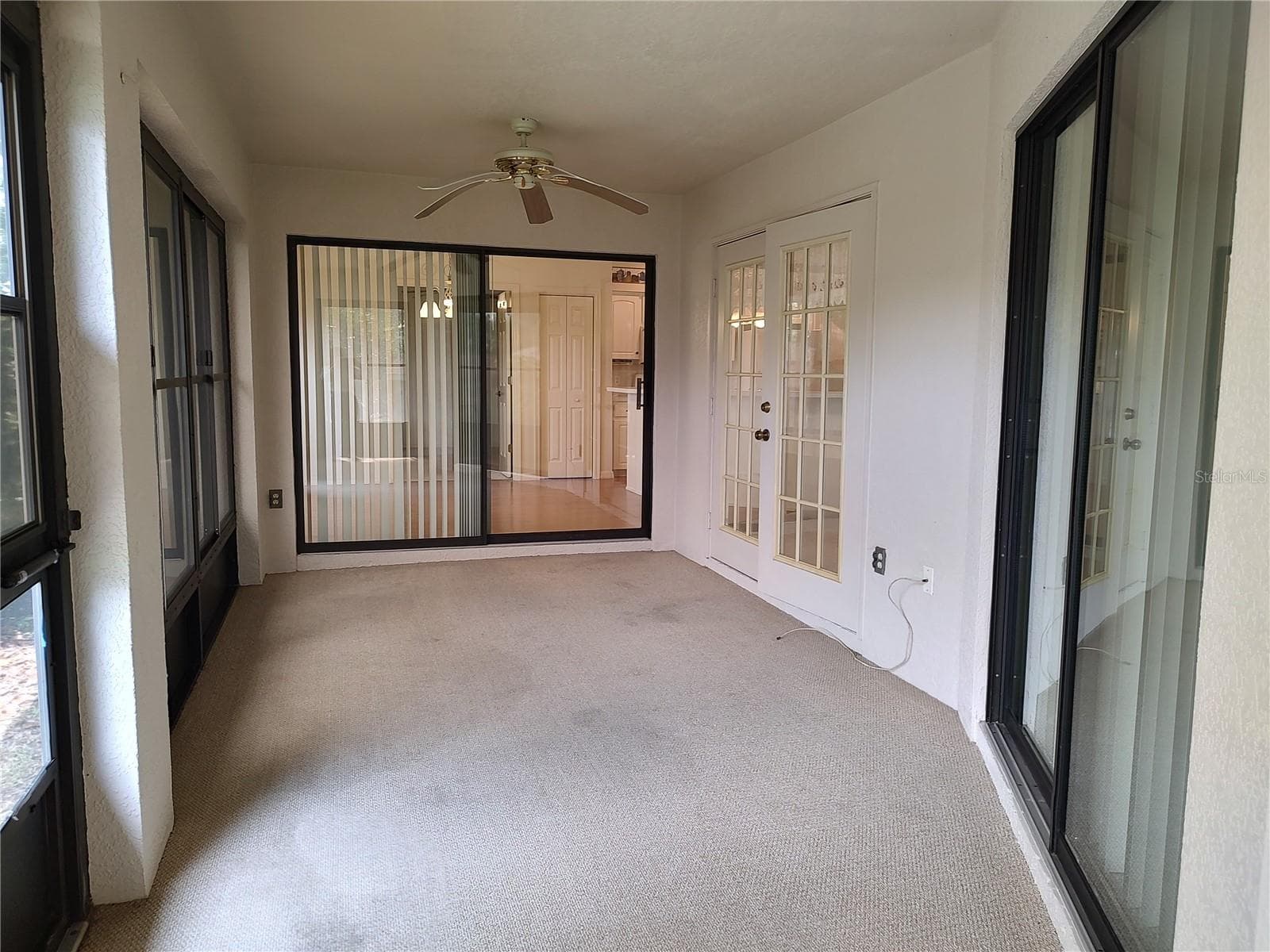 Back porch, screened vinyl windows - 3716 E COVE PARK TRL, HERNANDO
