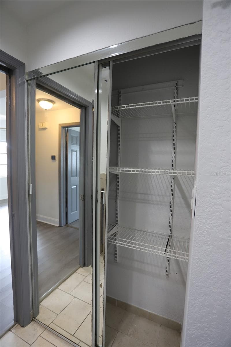 Hall full bath - linen closet (second linen storage in hallway) - 10011 110TH ST, SEMINOLE