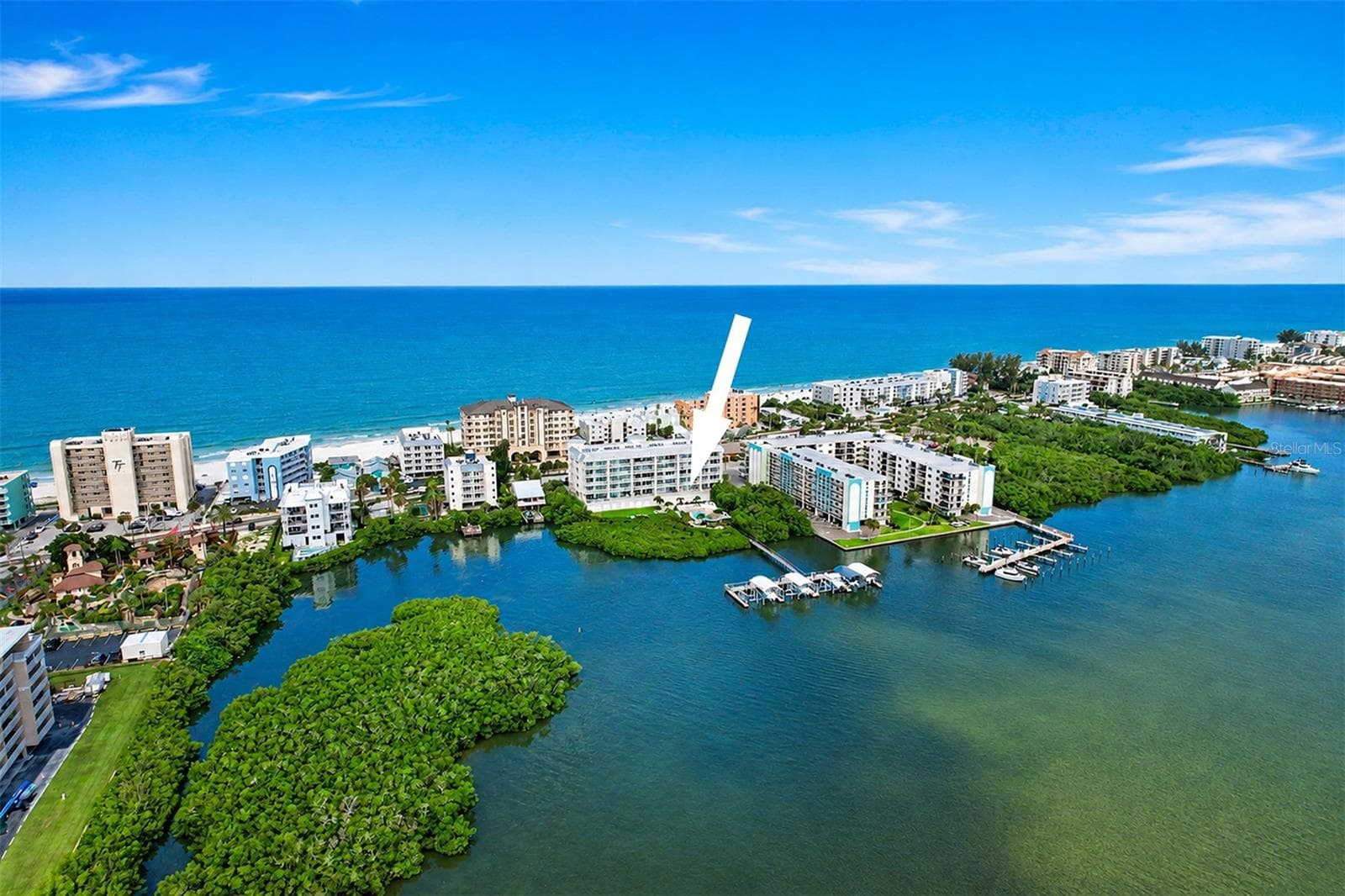 .. Residence 202 at the Dolphin Key Condo of Indian Shores Fl.. 3/2 with 1560 Sq Feet Plus an Extended 30' x 20' Waterfront Balcony. Poolside Cabana & Garage Parking Spot #1 Convey with Condo along with Outside Spot # 43.. Beach Access Right Across the Street. .. Indian Shore Florida is known as ' THE NARROWS '.. The Beach and the Intracoastal are right across from street from each other. The best of both worlds.. Our Beaches are never crowded here due to the topography of the land, there is very limited public parking - Hence no crowded Beaches.. - 19519 GULF BLVD #202, INDIAN SHORES