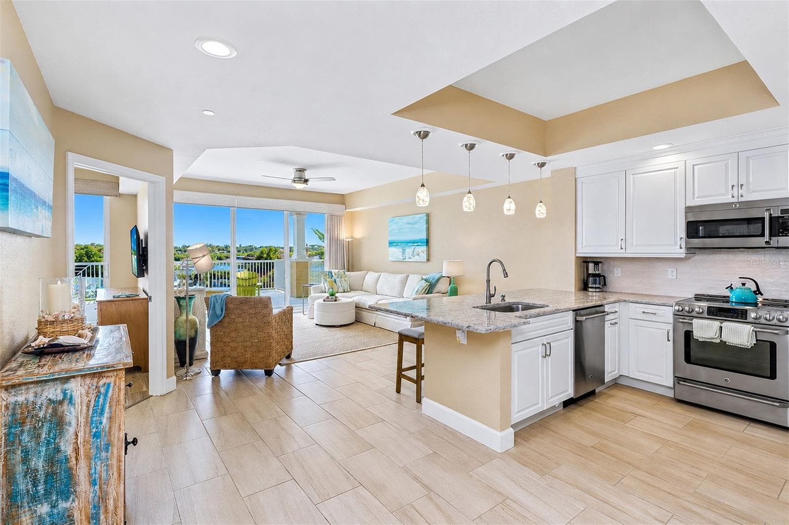 .. Front of Unit by Intracoastal Waterway.. Tiled Plank Flooring Thru- Out all Liivng Area's and Bathrooms. New Premier Luxury Vinyl Flooring in Bedrooms.. - 19519 GULF BLVD #202, INDIAN SHORES