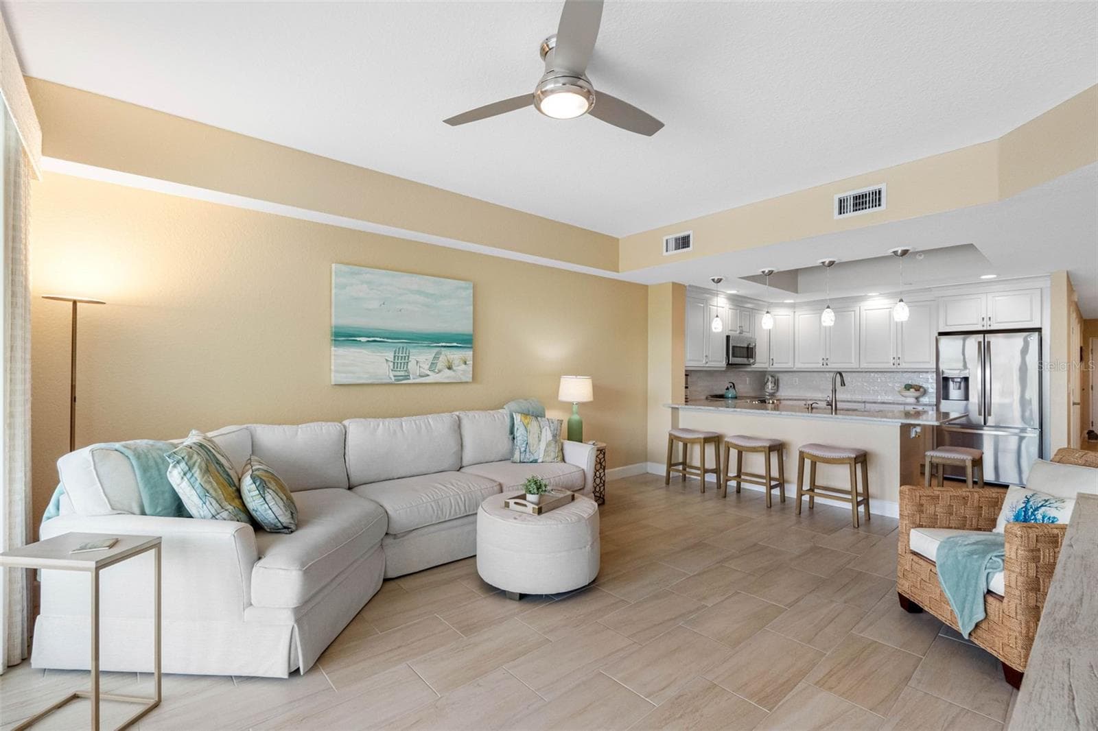 ...INTERIOR SHOT.. Photo without rug to Show Wood Plank Tile Thru -Out all Living Areas & Bathrooms.. All 3 Bedrooms have New Luxury Vinyl Flooring. Condo Shows Great. Turn Key. - 19519 GULF BLVD #202, INDIAN SHORES