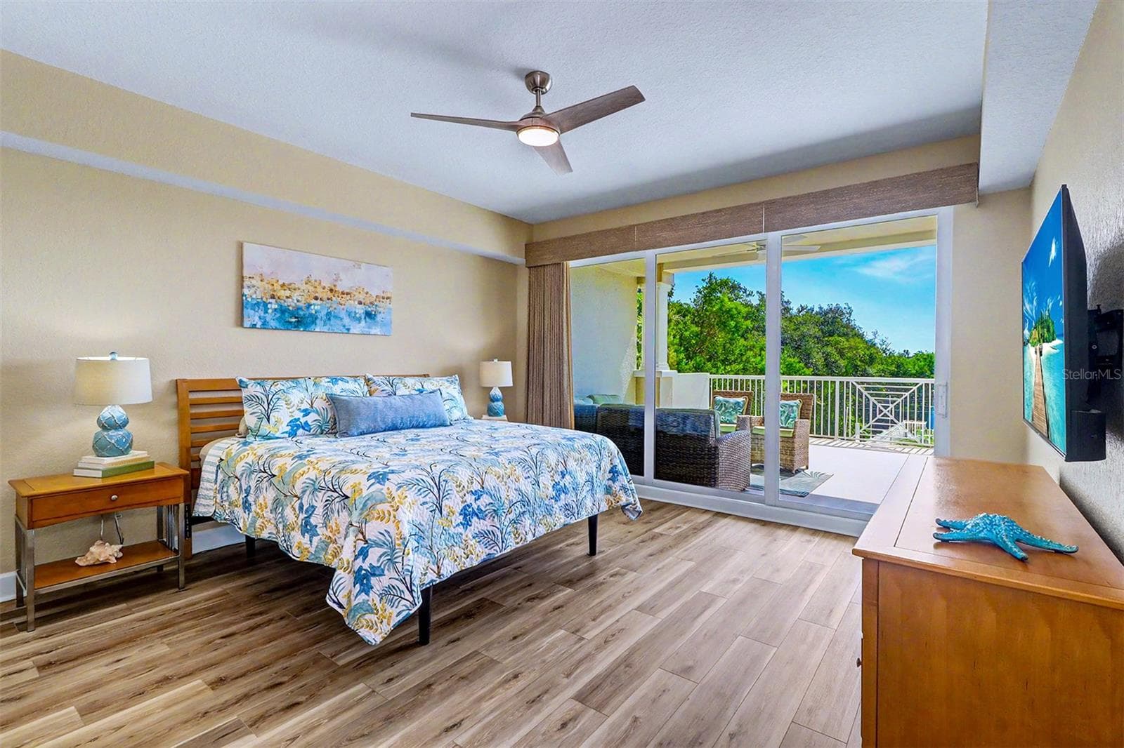 ... MASTER SUITE - TRIPLE HIGH IMPACT SLIDERS CAN RECESS BACK TO 8 FOOT OPENING. NEW FLOORING, NEW FAN , NEW WALL FINISH PLUS NEW CUSTOM 2 WAY FLOOR TO CEILING WOVEN WOOD BLACK OUT DRAPES. - 19519 GULF BLVD #202, INDIAN SHORES