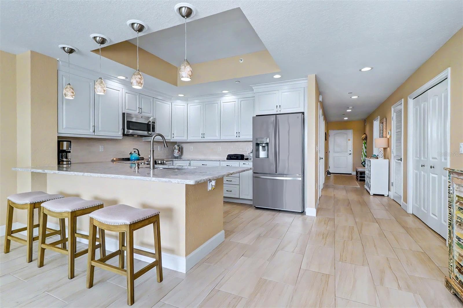 ... 3 Bedroom / 2 Bath / 1560 Sq Ft.. Circa 2017.. Hallway to Guest Bedrooms 2 and 3.. Full Bath in Hallway on Left. REFER TO FLOORPLANS FOR INTERIOR LAYOUT.. REFER TO FEATURE SHEET FOR UPGRADES.. - 19519 GULF BLVD #202, INDIAN SHORES