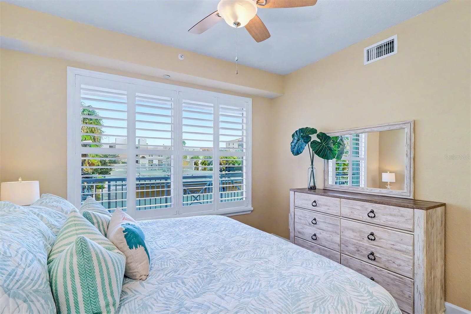 ... GUEST BEDROOM # ONE.. 11.5 X 13.5.. NOTE: Plantation Shutters with Window Sills. This Bedroom has Jack & Jill Access Bathroom Access. Perfect for Guest Privacy. - 19519 GULF BLVD #202, INDIAN SHORES