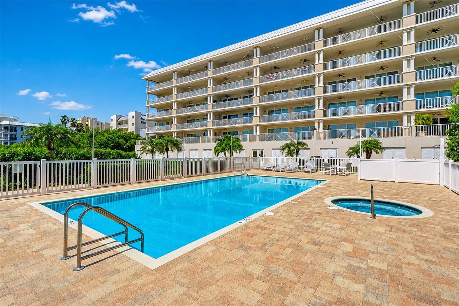 .. Large Heated Pool & Spa.. Dolphin Key installed new roof and exterior paint circa 2023.. Poolside Cabana # 10 behind Pool thru white doors.. - 19519 GULF BLVD #202, INDIAN SHORES