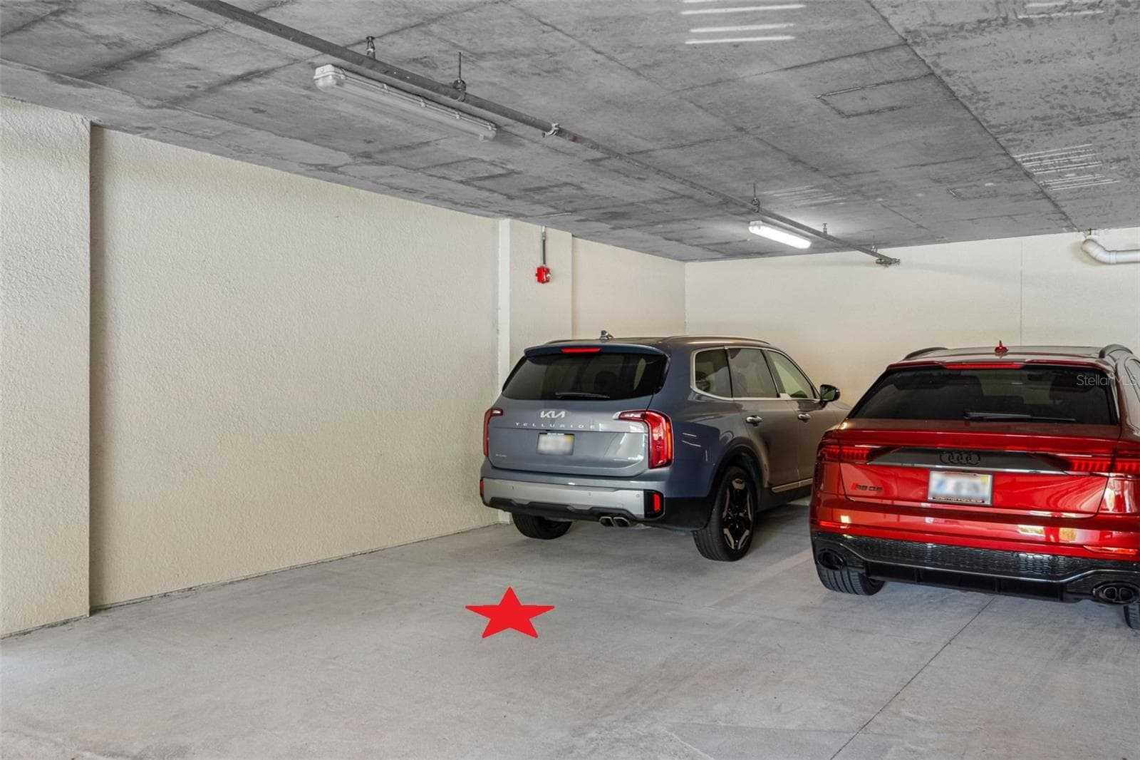 ... Garage Spot #1 Conveys with Unit ( Gray SUV in Spot ).. Spot number Two is outside and marked #43.. There is also plenty of guest parking. - 19519 GULF BLVD #202, INDIAN SHORES