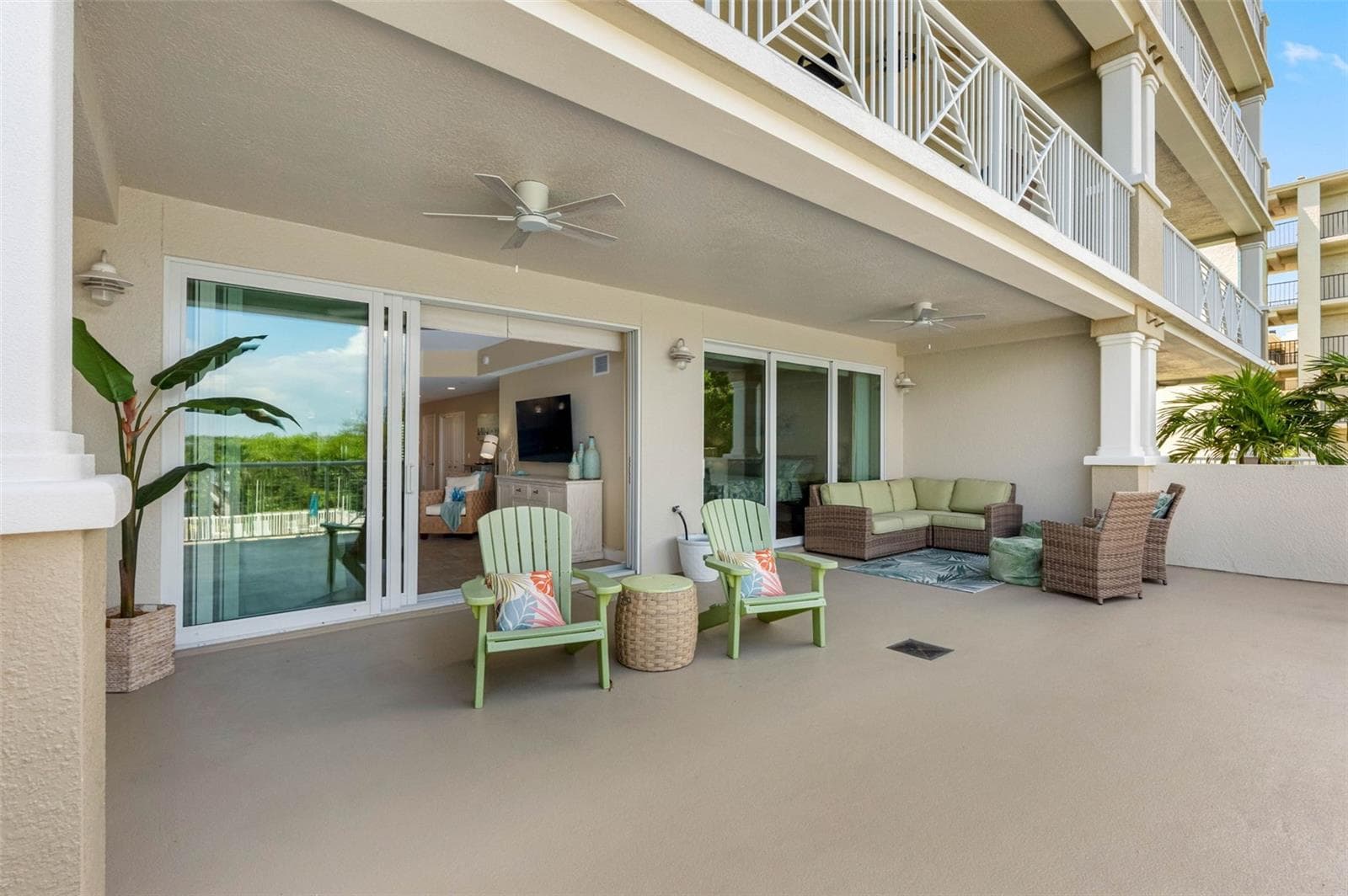 .... Photo #1 of X Large 20' x 30' Balcony Looking Back into Condo From South End. It's Akin to Having Your Own Back Yard. Half is Open and Half is Shaded. Just a Wonderful Living Space. - 19519 GULF BLVD #202, INDIAN SHORES