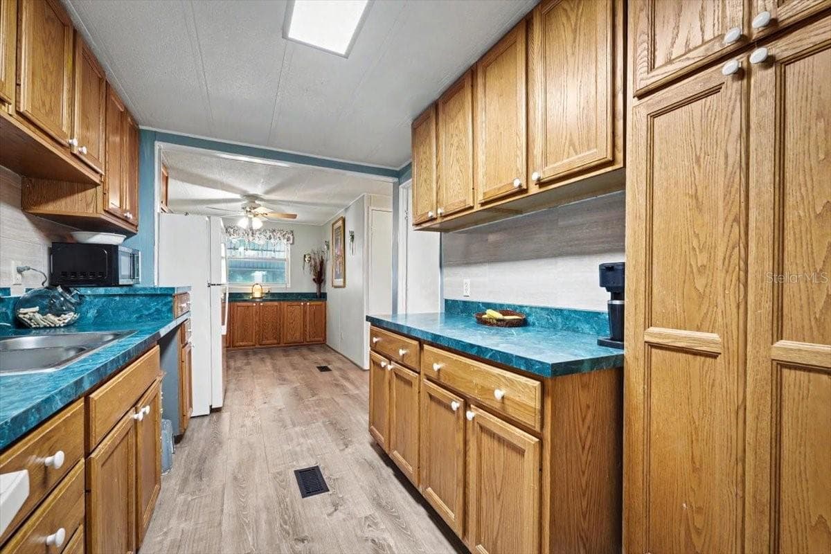 Manufactured Home at 104 EDGEWATER RD, SATSUMA, photo 12 of 73