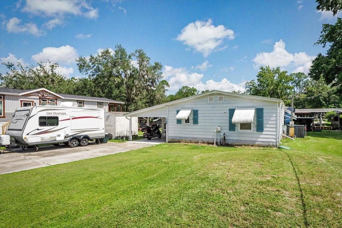 Manufactured Home at 104 EDGEWATER RD, SATSUMA, photo 72 of 73