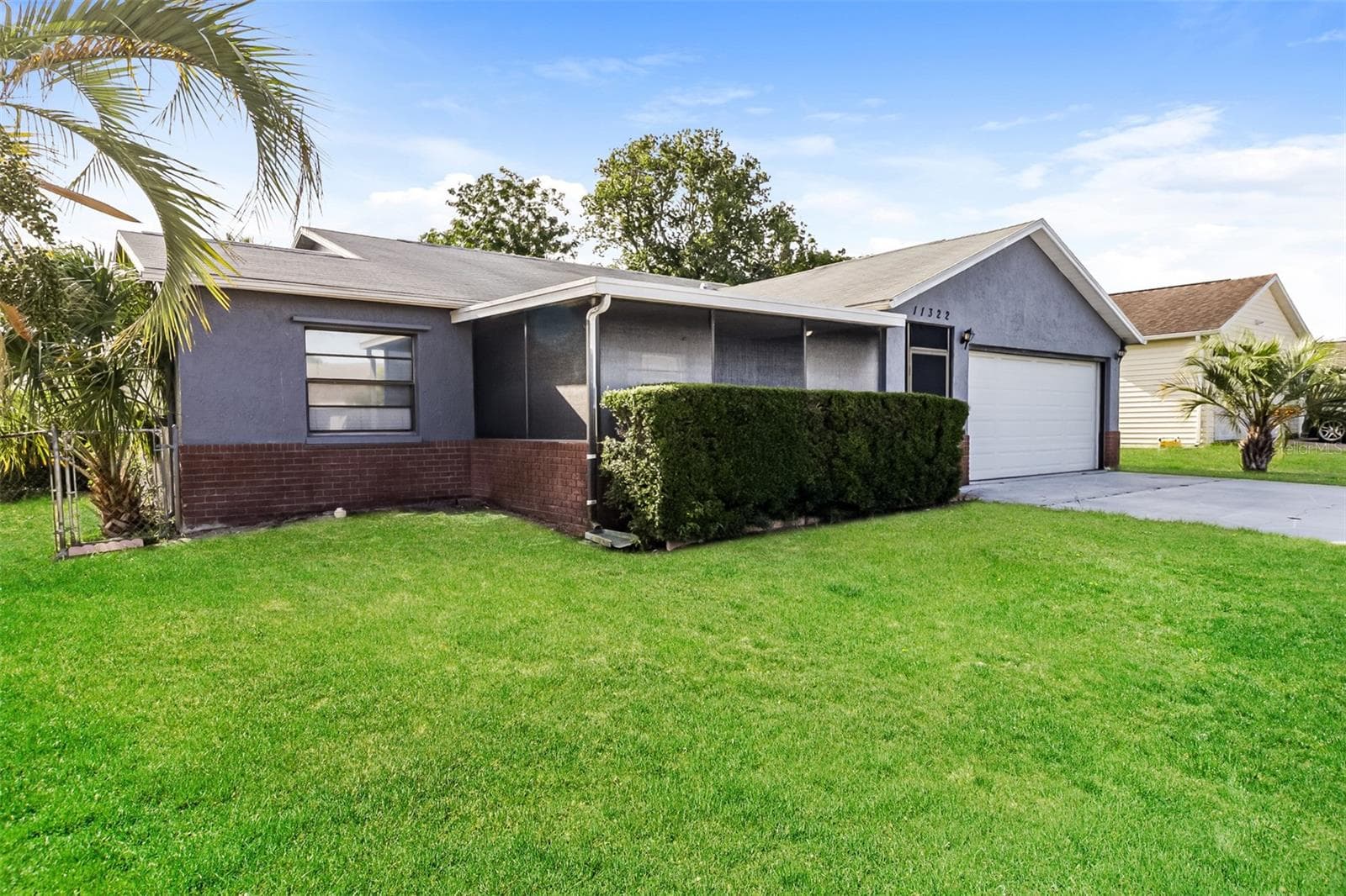 Single Family Residence at 11322 WOLF CT, PORT RICHEY, photo 2 of 21