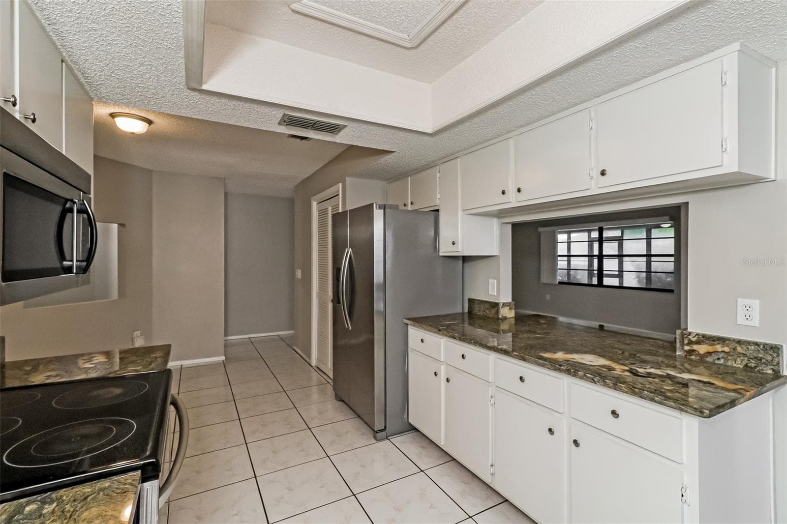 Single Family Residence at 11322 WOLF CT, PORT RICHEY, photo 8 of 21