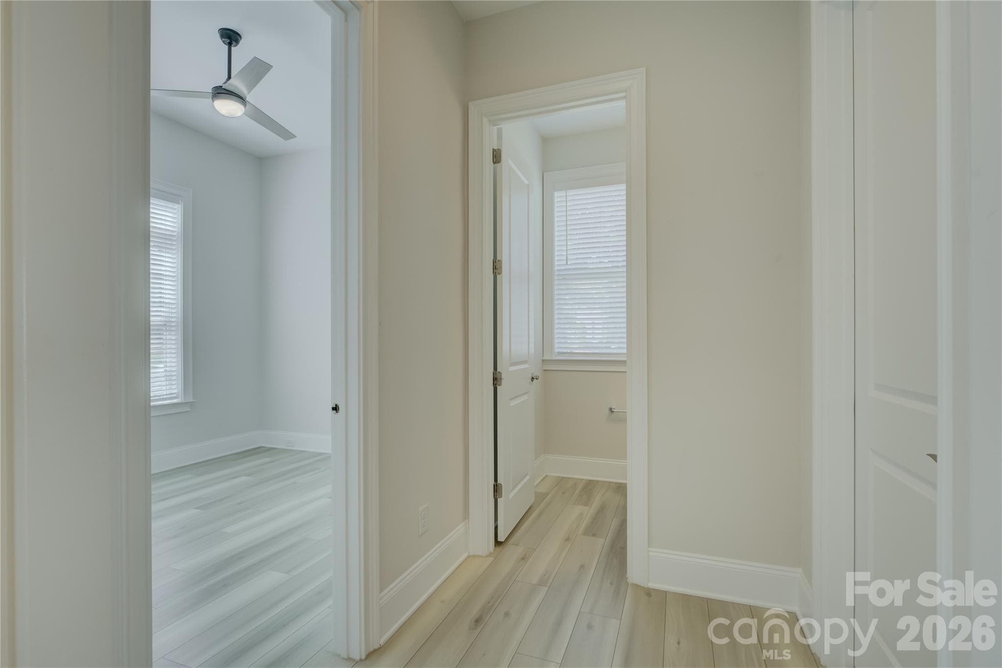 Hallway to the office and 1/2 bath - 82105 Standing Oak Drive, Charlotte
