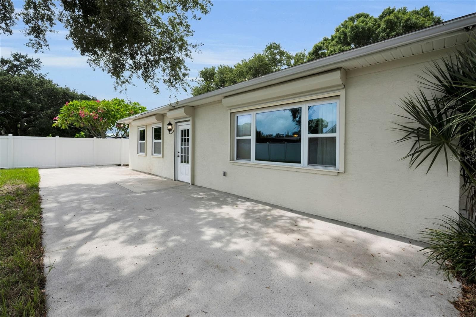 Huge Patio off the back of the home in the backyard. - 13760 87TH PL, SEMINOLE