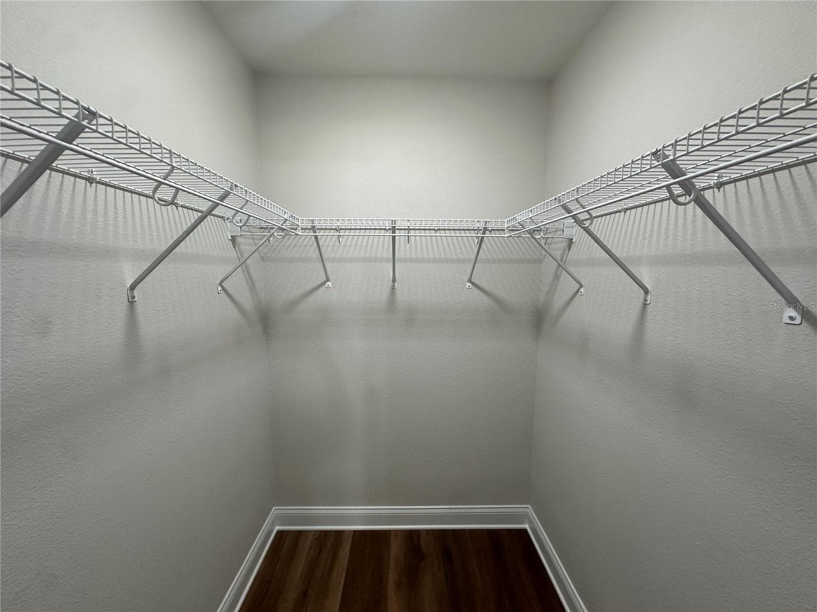 Primary Closet - 100 EL CAMINO DR #104, WINTER HAVEN