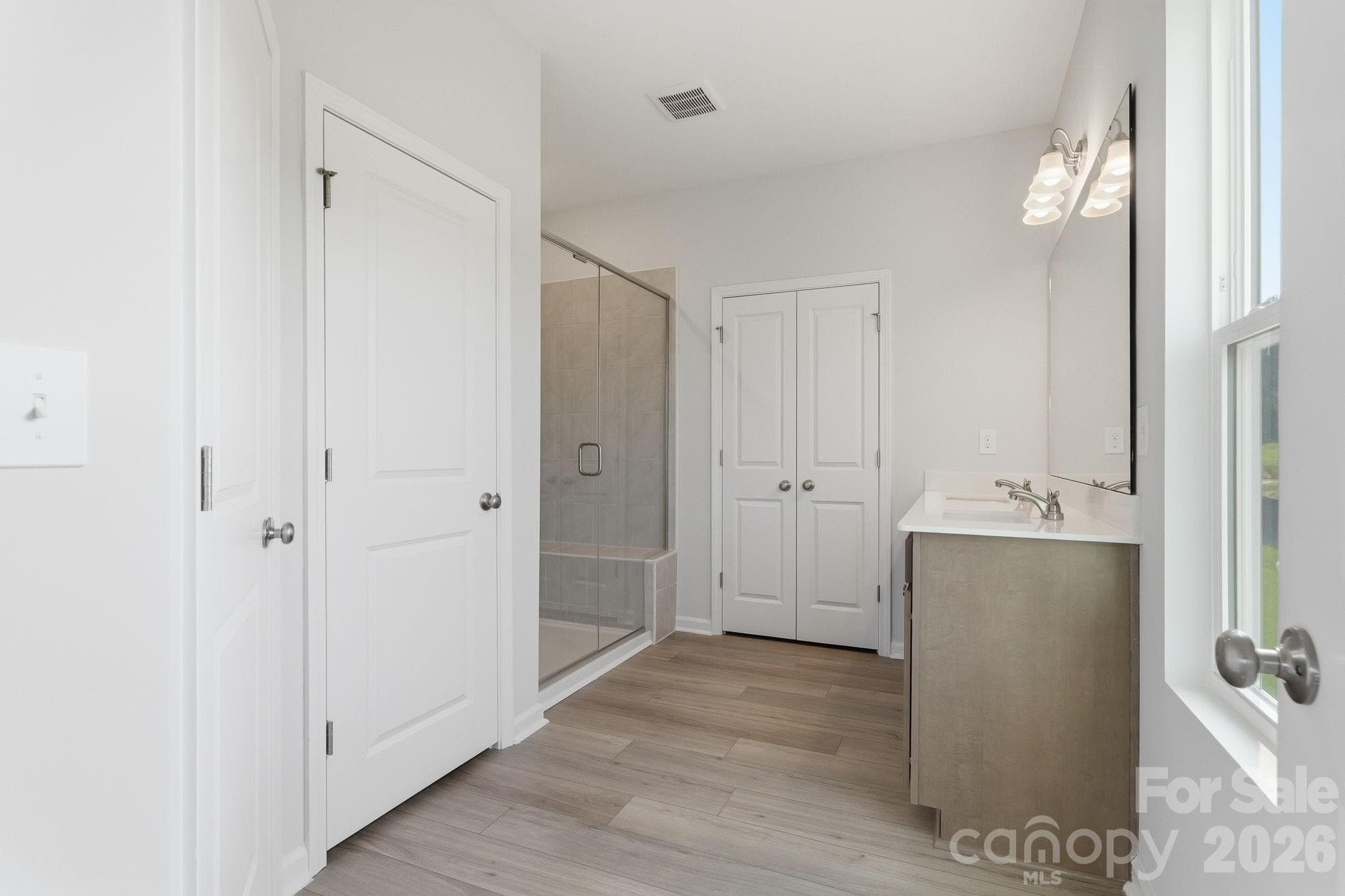 Primary tile shower with bench - Shelby