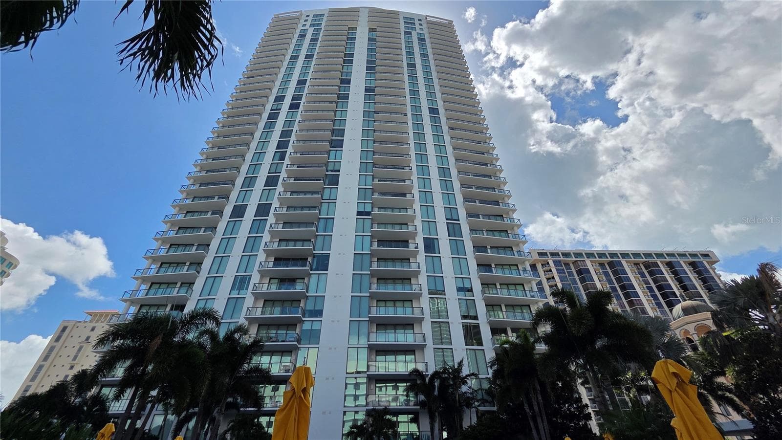 Rear of building from pool deck and view of balcony - 100 1ST AVE N #2406, ST PETERSBURG
