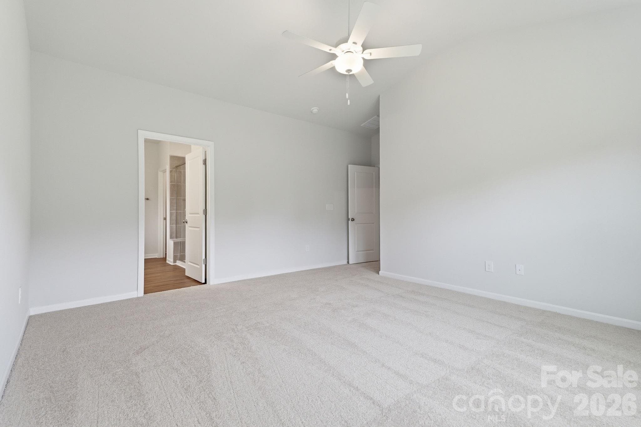 Primary Bedroom into bathroom - 204 Rodeo Drive, Shelby