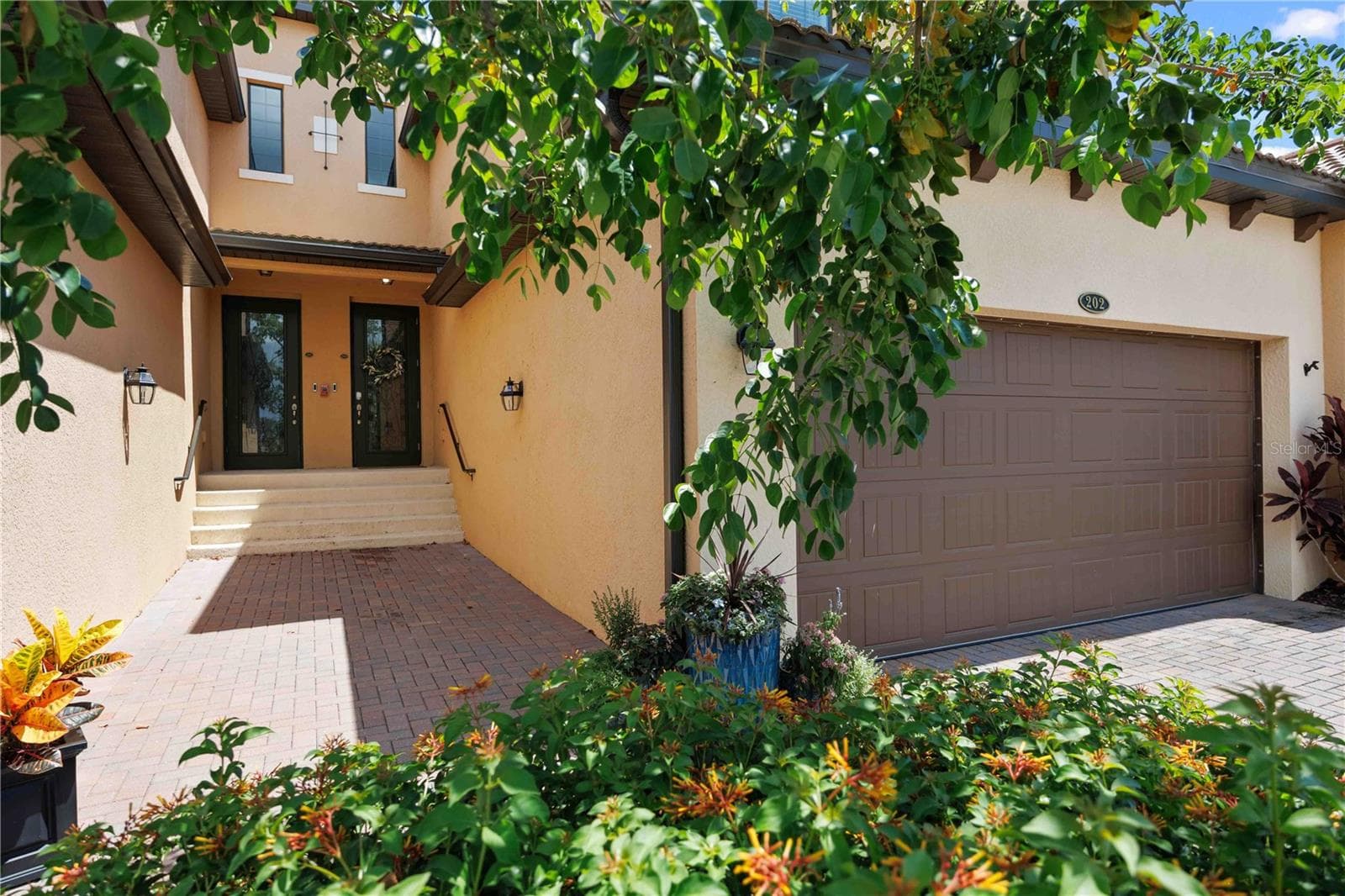 Great landscaping around the home - 10821 TARFLOWER DR #202, VENICE