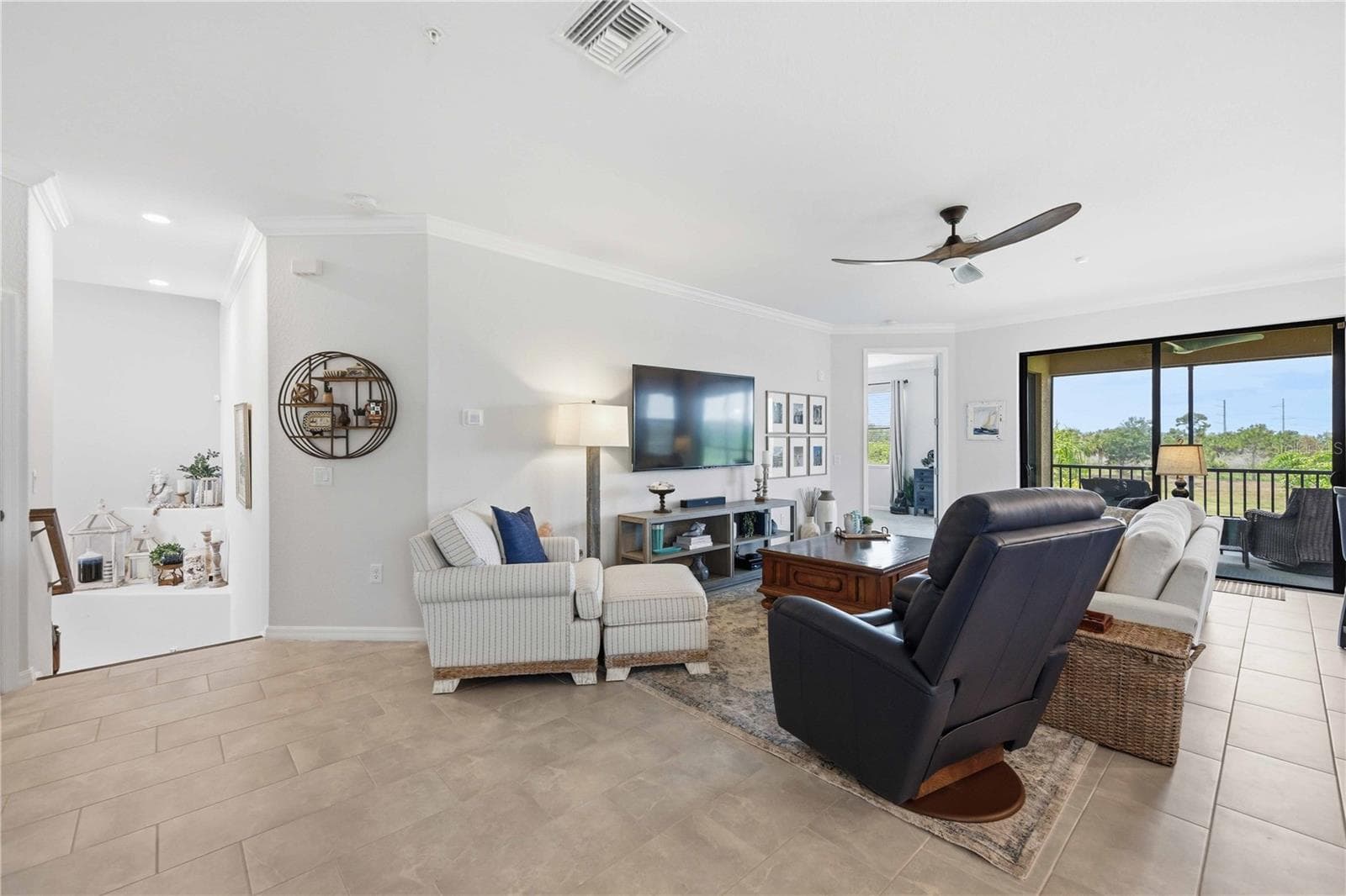 More than 2200 sq ft of fabulous living.  Complete with all appliances, and easy living overlooking a beautiful lake - this home comes with two golf memberships to the newly designed Fry Straka course . - 10821 TARFLOWER DR #202, VENICE