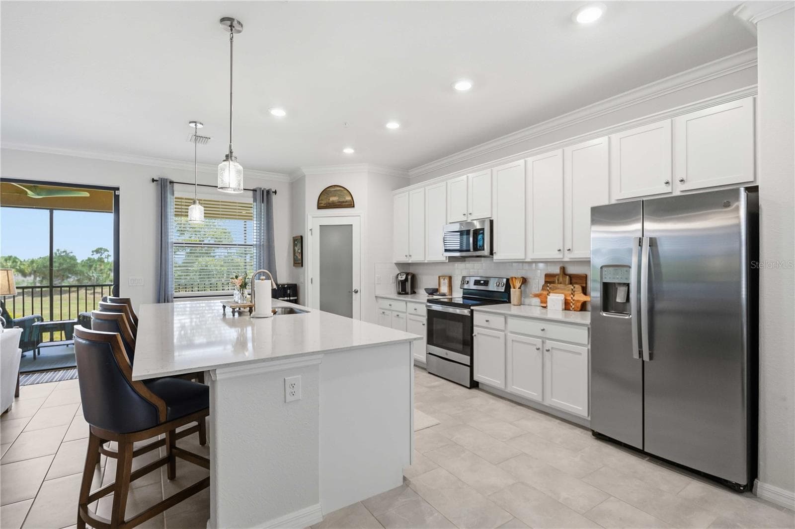 The counter easily seats 4 people - 10821 TARFLOWER DR #202, VENICE