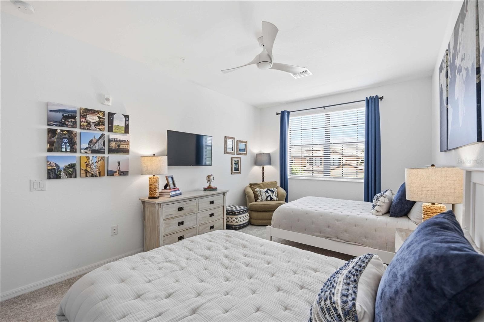 Guest room 3 has two full beds for guests. And there is ample room to move around. - 10821 TARFLOWER DR #202, VENICE